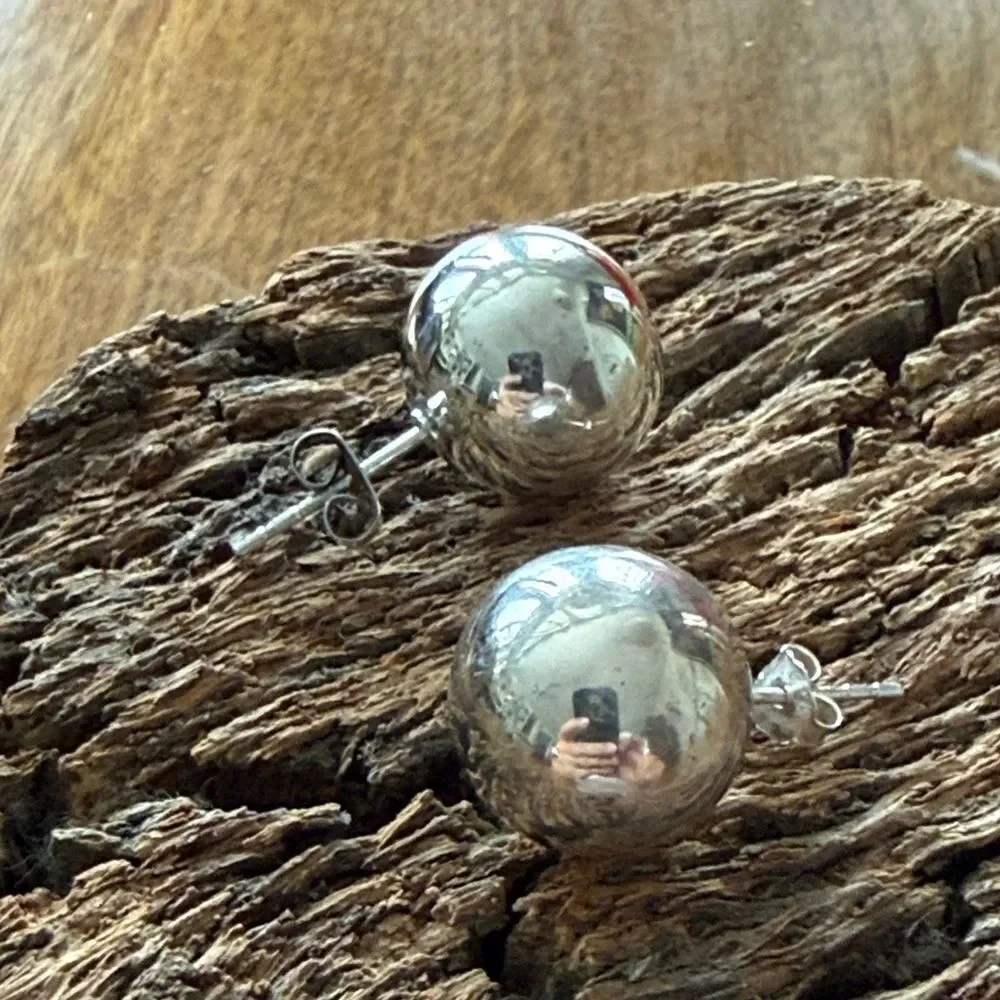 Unmarked sterling silver earrings